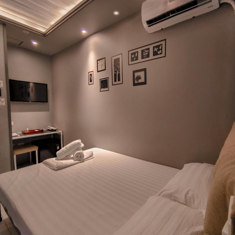 TV a/nebo společenská místnost v ubytování Hotel Snow Angeles