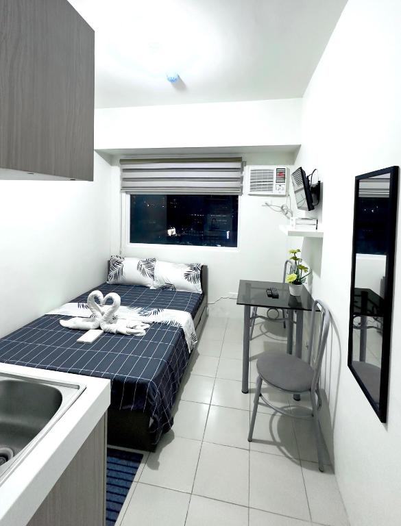 Kuchyň nebo kuchyňský kout v ubytování Arkisha’s Cozy Place