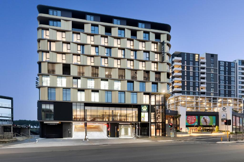 a tall building with a street in front of it at Quest Woolooware Bay in Cronulla