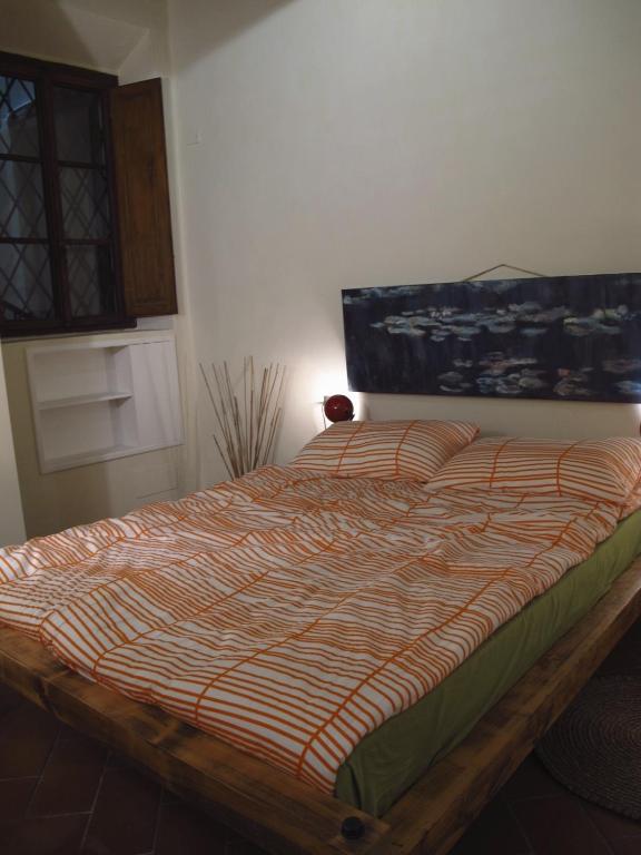 A bed or beds in a room at Casa Lorena