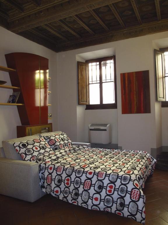 A bed or beds in a room at Casa Lorena