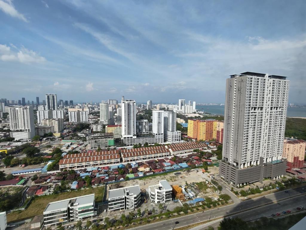Nespecifikovaný výhled na destinaci Jelutong nebo výhled na město při pohledu z apartmánu