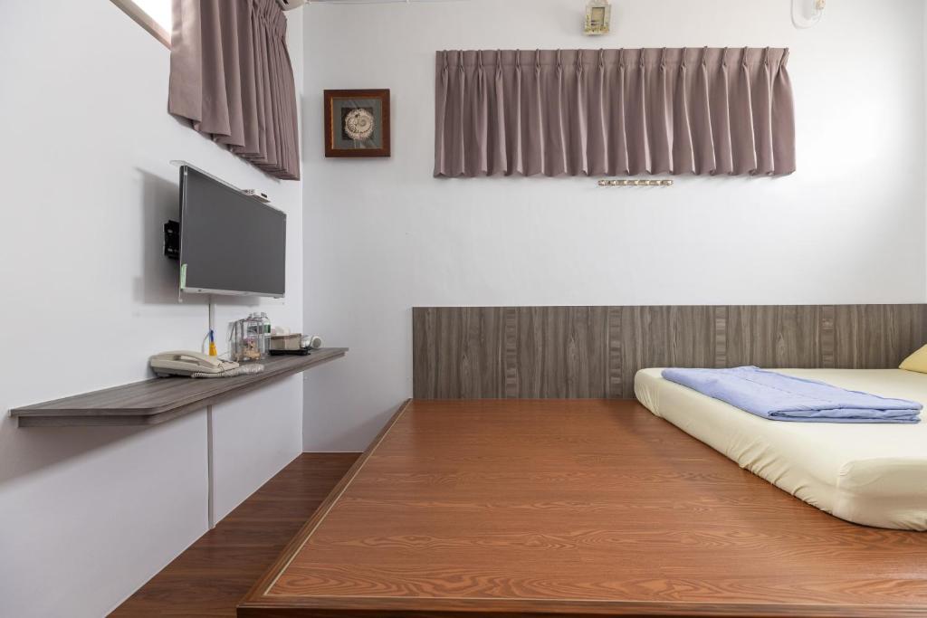 TV a/nebo společenská místnost v ubytování Jinshawan B&B