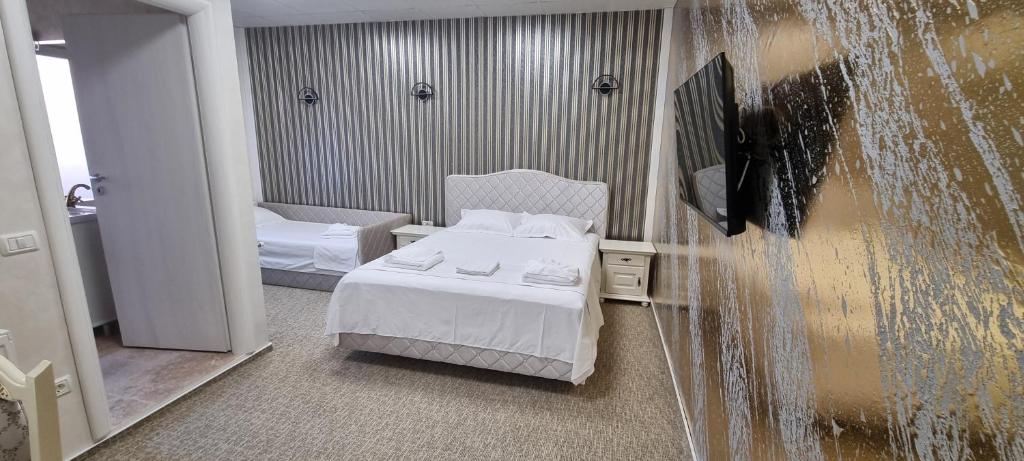 Postel nebo postele na pokoji v ubytování DNT HOUSE 2
