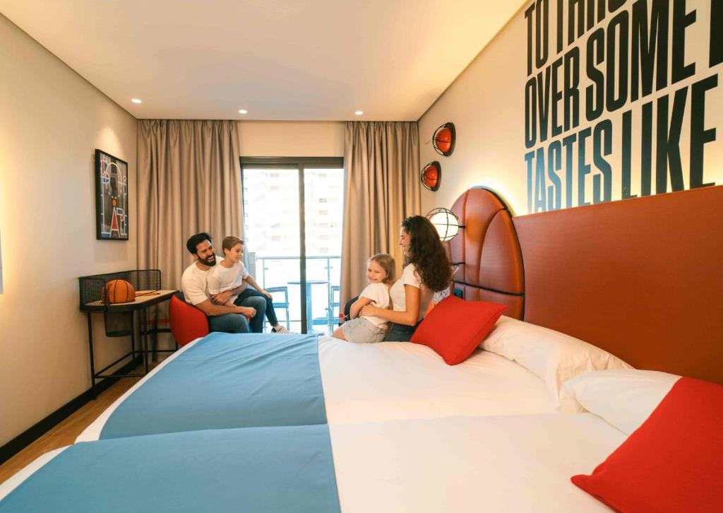 Postel nebo postele na pokoji v ubytování Hotel Magic Sports 4