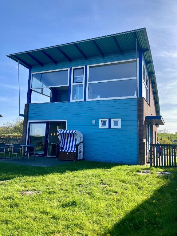 6pers. Lauwersmeer Lakefront. Nirvana house with sauna, pellet stove - Bungalow