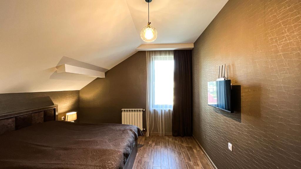Postel nebo postele na pokoji v ubytování Dani Lux Apartments