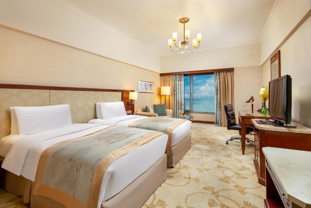 TV a/nebo společenská místnost v ubytování Shangri-La Beihai