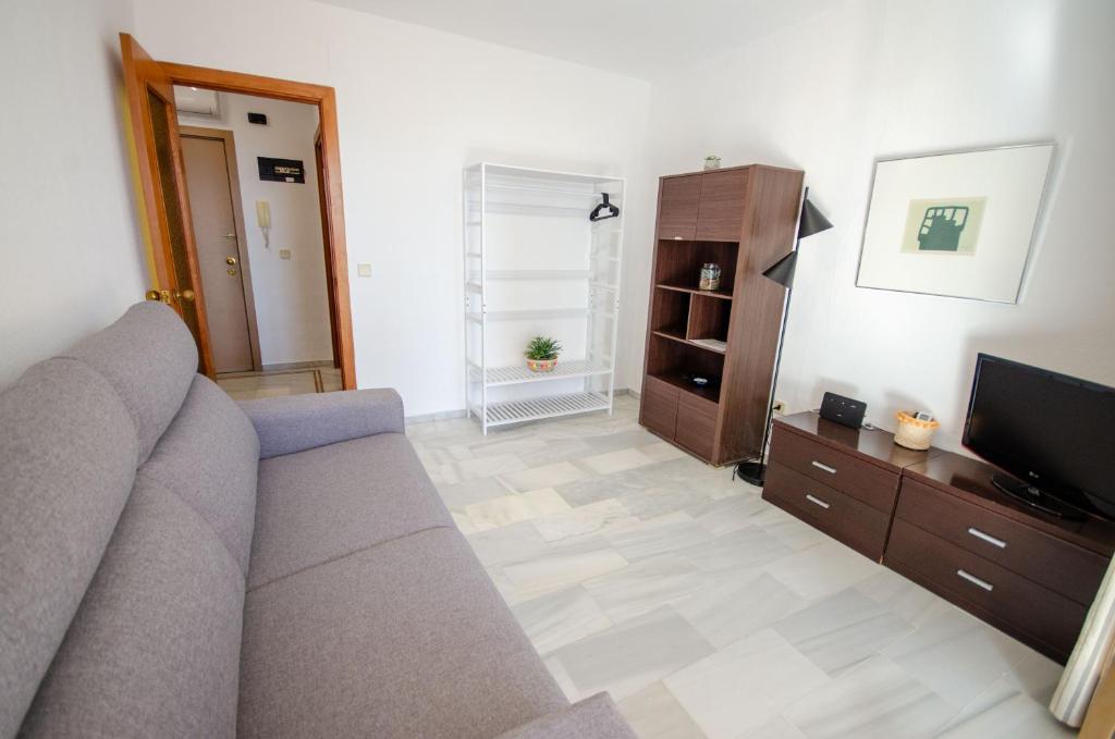 A television and/or entertainment centre at ARENA 8 Levante Beach