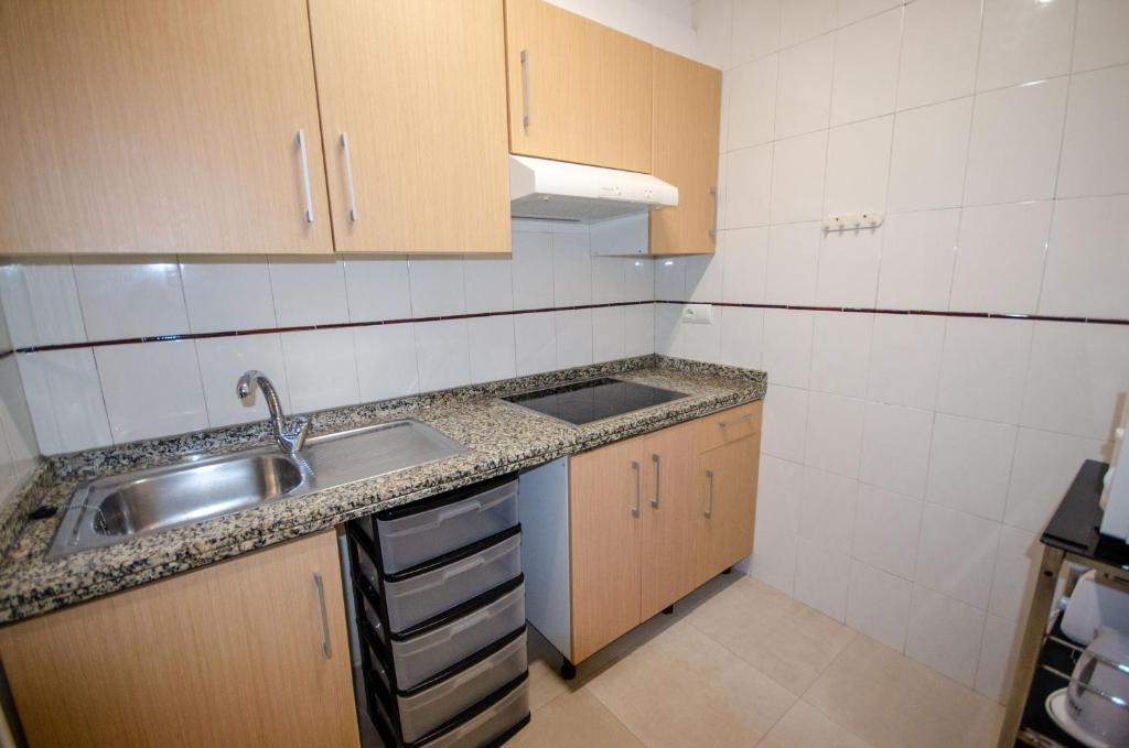 A kitchen or kitchenette at ARENA 8 Levante Beach