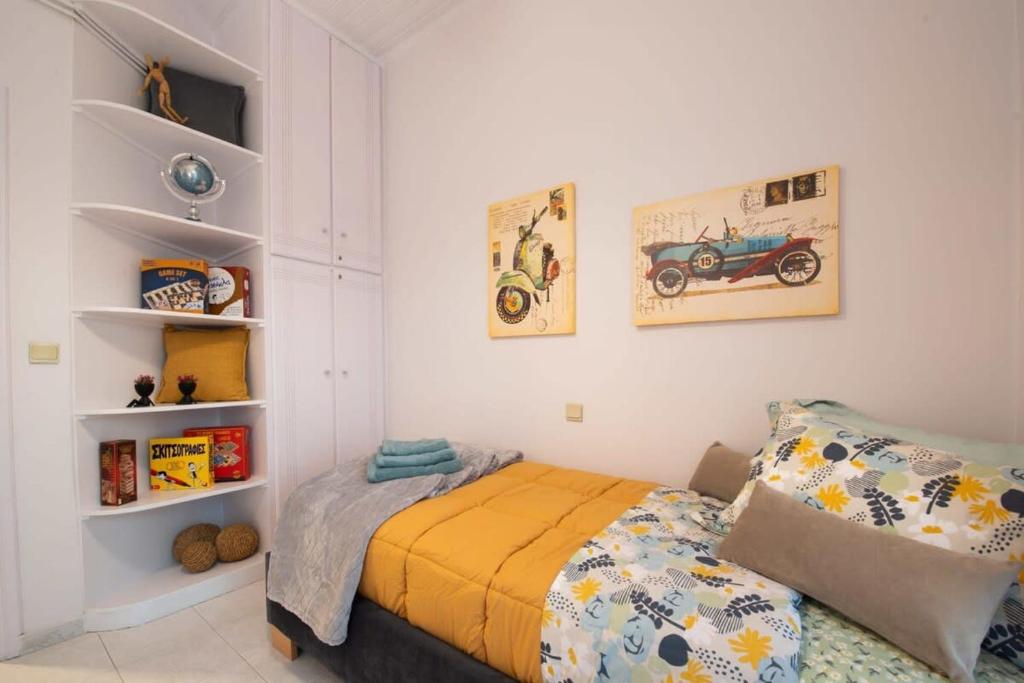 A bed or beds in a room at Dolce Favola Nomad Casa - Kalamata's City Getaway