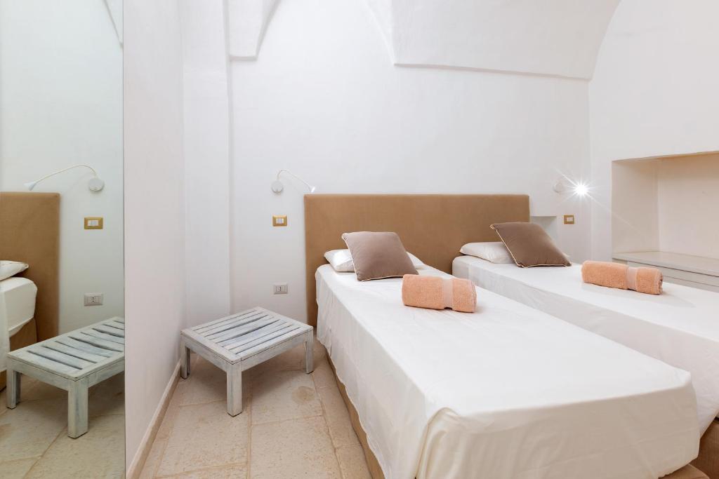 Postel nebo postele na pokoji v ubytování La Loggetta