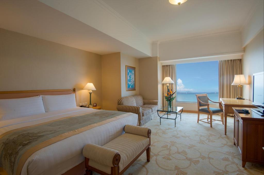 Postel nebo postele na pokoji v ubytování Shangri-La Beihai