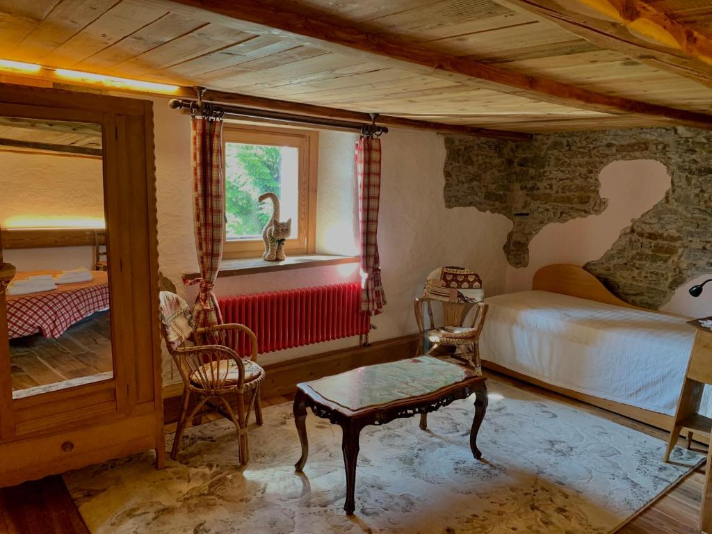 Posteľ alebo postele v izbe v ubytovaní Chalet del Lago