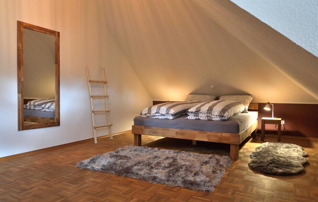 En eller flere senge i et værelse på Appartement Whispering Tree Groß
