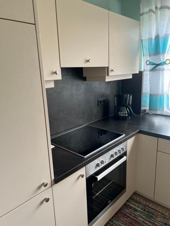 Kuchyň nebo kuchyňský kout v ubytování Gästehaus Maria
