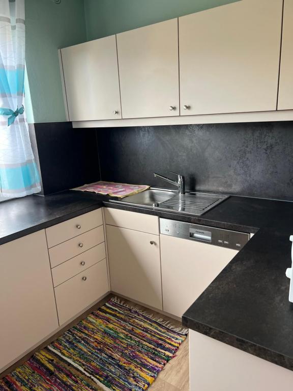 Kuchyň nebo kuchyňský kout v ubytování Gästehaus Maria