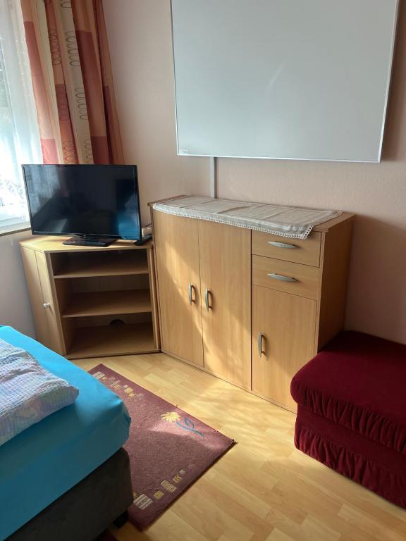 TV a/nebo společenská místnost v ubytování Gästehaus Maria