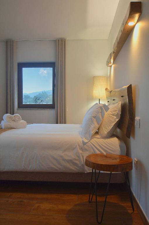 Postel nebo postele na pokoji v ubytování Quinta do Limite - Agroturismo