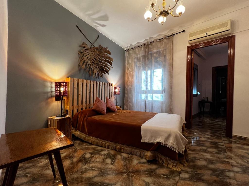 Posteľ alebo postele v izbe v ubytovaní Las Parras House - ViviendaRural en Torredelcampo