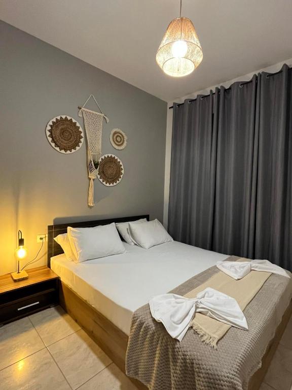 Posteľ alebo postele v izbe v ubytovaní Maya Suites Kallithea