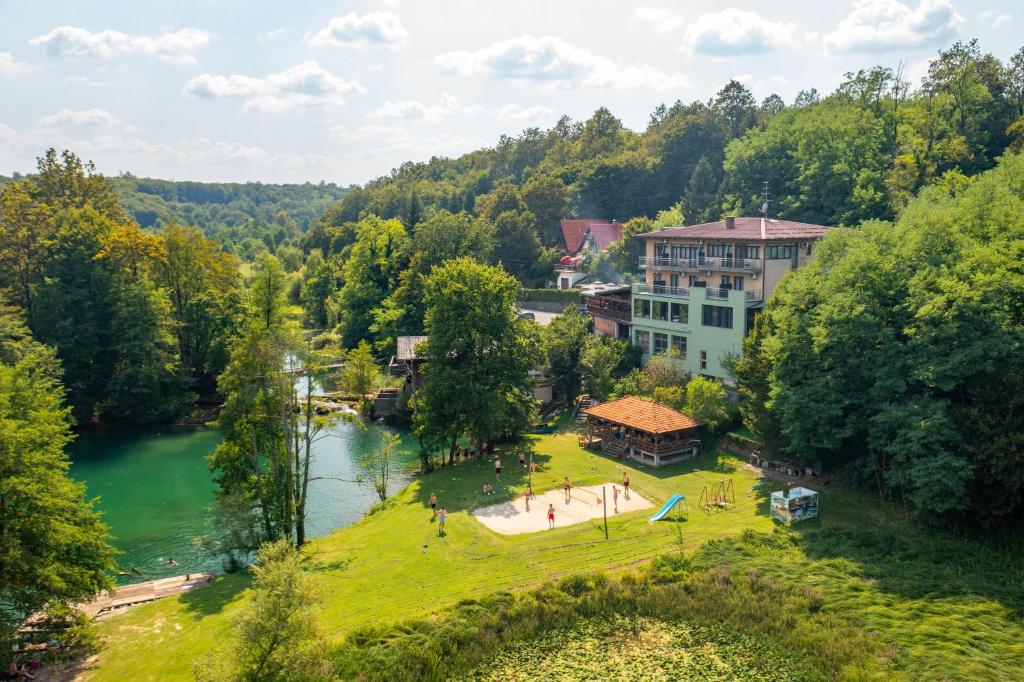 an aerial view of a park next to a river at Bed & Breakfast Zeleni Kut in Gornji Zvečaj