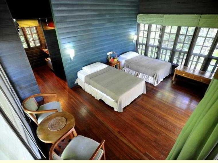 Postel nebo postele na pokoji v ubytování Permai Rainforest Resort