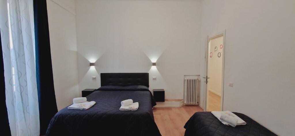 Postel nebo postele na pokoji v ubytování Piumith Guest House