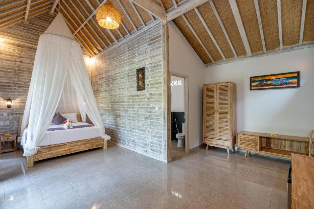 Postel nebo postele na pokoji v ubytování Le Biu garden View
