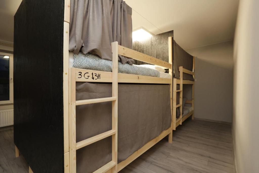 Postel nebo postele na pokoji v ubytování Regem Hostel