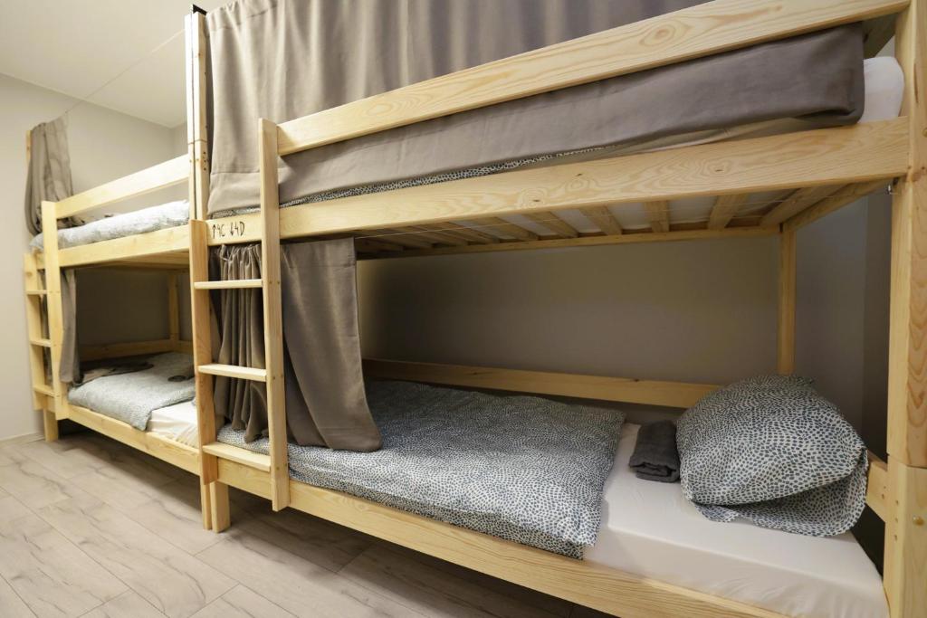 Postel nebo postele na pokoji v ubytování Regem Hostel