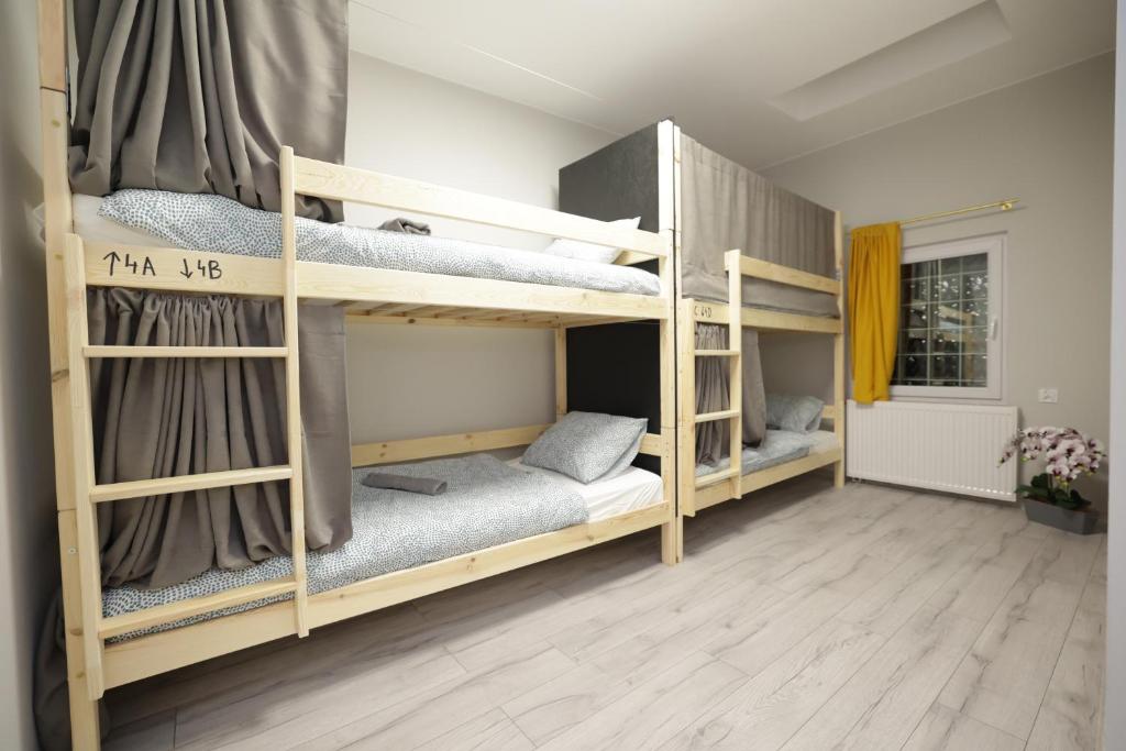 Postel nebo postele na pokoji v ubytování Regem Hostel