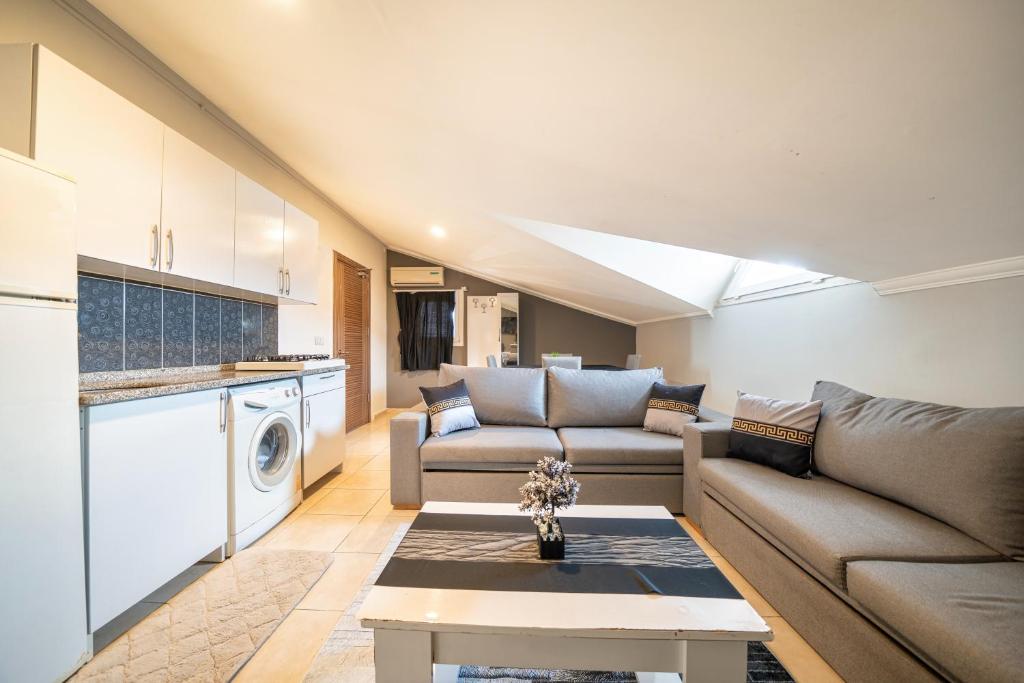 Kuchyň nebo kuchyňský kout v ubytování MASAL APART HOTEL