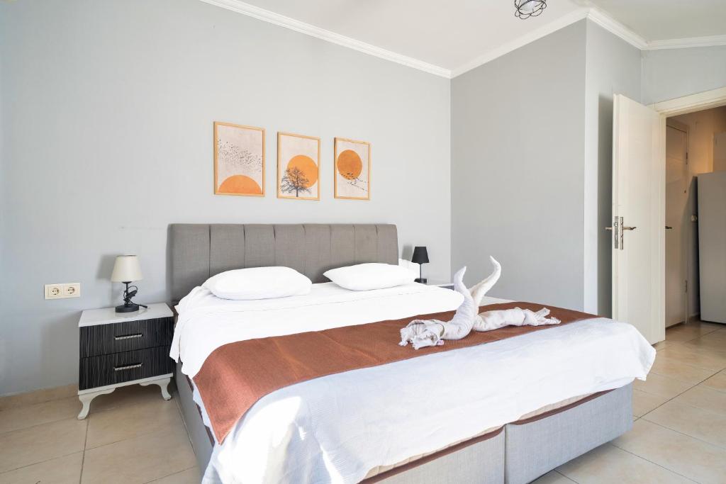 Postel nebo postele na pokoji v ubytování MASAL APART HOTEL