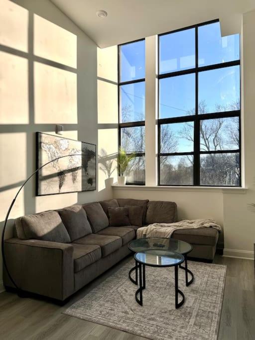 a living room with a couch and a table at MEB Loft in Darby