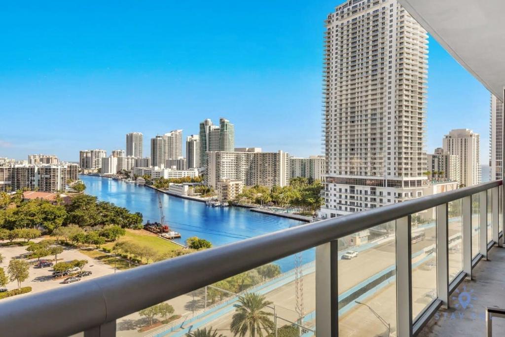 a view of a river in a city with buildings at Infinite Views, Amazing Pool, Gym, Near Beach in Hallandale Beach