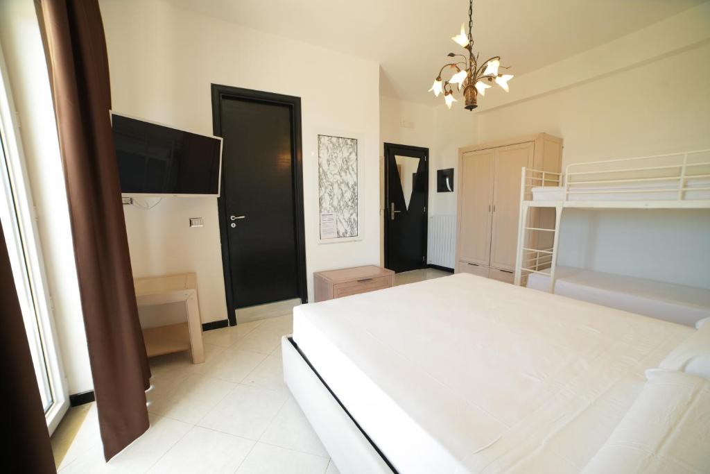 Postel nebo postele na pokoji v ubytování Villa Miramare