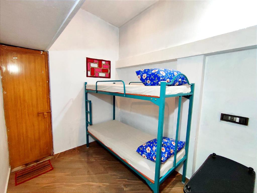 Postel nebo postele na pokoji v ubytování Raelyn's Homestay