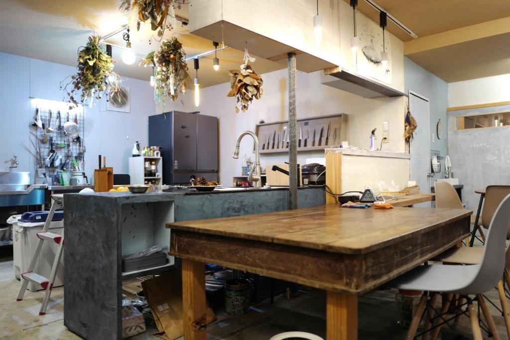 Kuchyň nebo kuchyňský kout v ubytování すくもBOX guesthouse