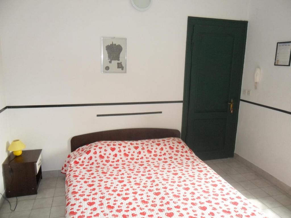 Postel nebo postele na pokoji v ubytování Apartments Villa Dube