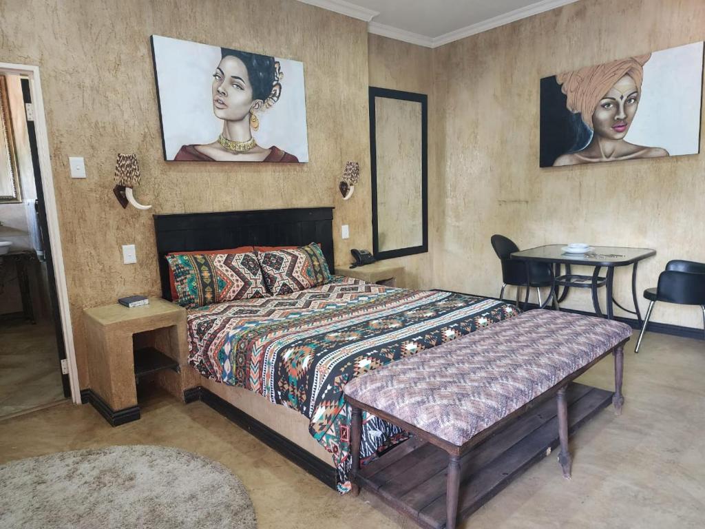 Ένα ή περισσότερα κρεβάτια σε δωμάτιο στο South Gate Lodge