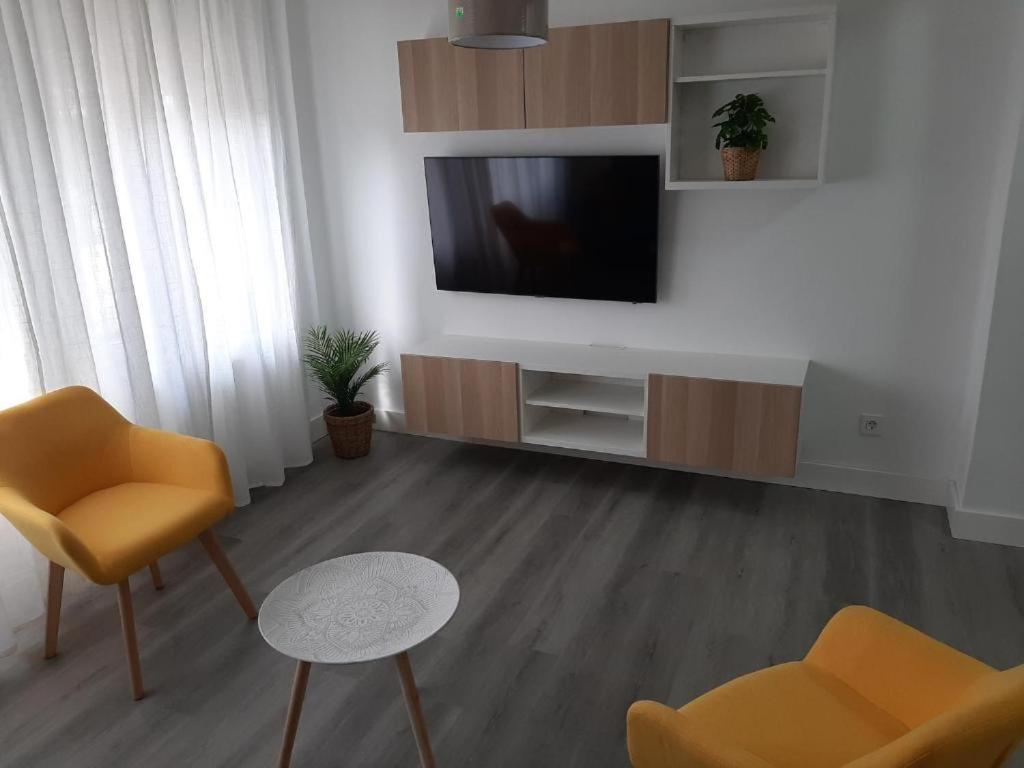TV a/nebo společenská místnost v ubytování Reconquista 1