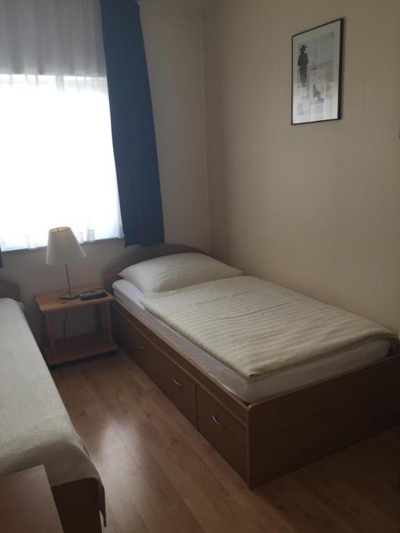 Postel nebo postele na pokoji v ubytování Hotel Restaurant Zagreb