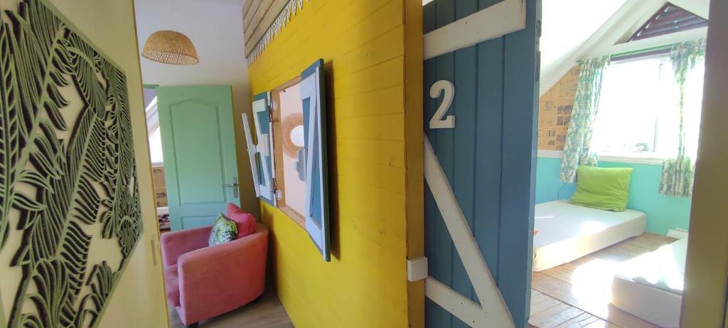 Postel nebo postele na pokoji v ubytování Ô PasSage - Kaz Auberge