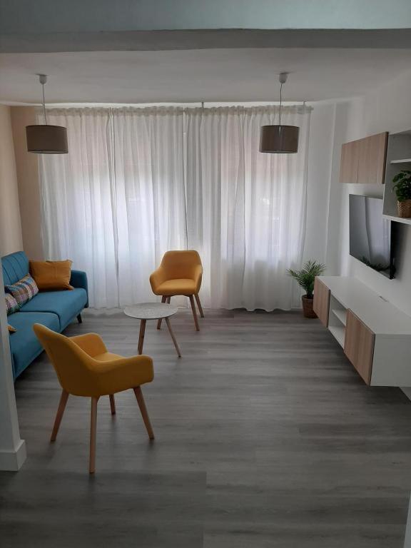 TV a/nebo společenská místnost v ubytování Reconquista 1