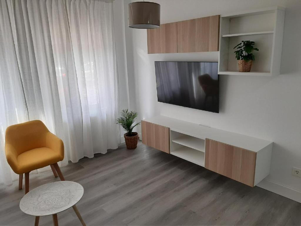 TV a/nebo společenská místnost v ubytování Reconquista 1