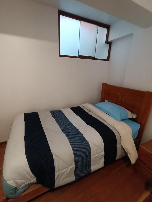 Postel nebo postele na pokoji v ubytování linda house cusco