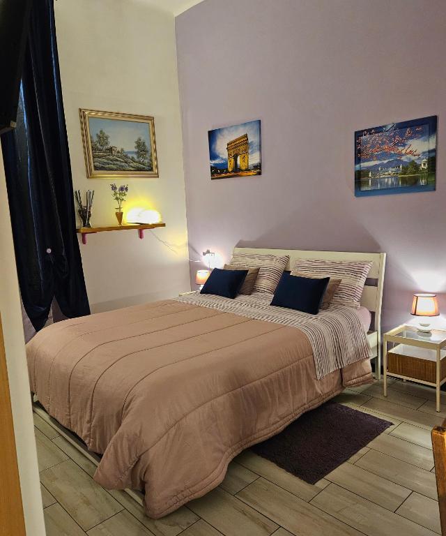 Łóżko lub łóżka w pokoju w obiekcie B&B Villa Emilia Milano