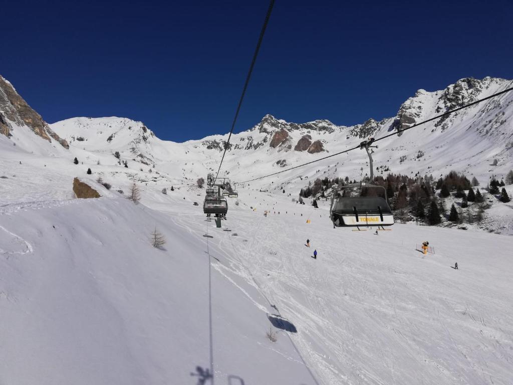Obiekt DONCIO`S Ski Hike & Bike Apartment zimą