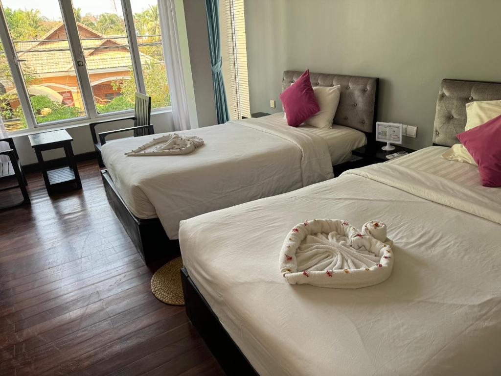 Postel nebo postele na pokoji v ubytování Hotel La Maravilla